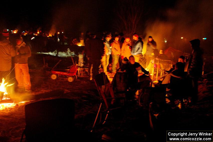 Rally fans around a bonfire at the finish of SS6, Quinnan-Sage Creek II.