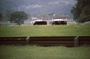 John Kalagian / Steve Shelton March 85G/Porsche and Drake Olson / Bobby Rahal Porsche 962 head through turn 7.