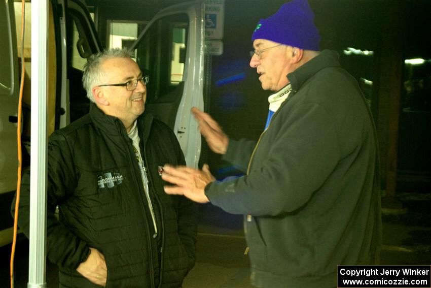 Doug Shepherd and Enda McCormack converse at Atlanta service after day one.