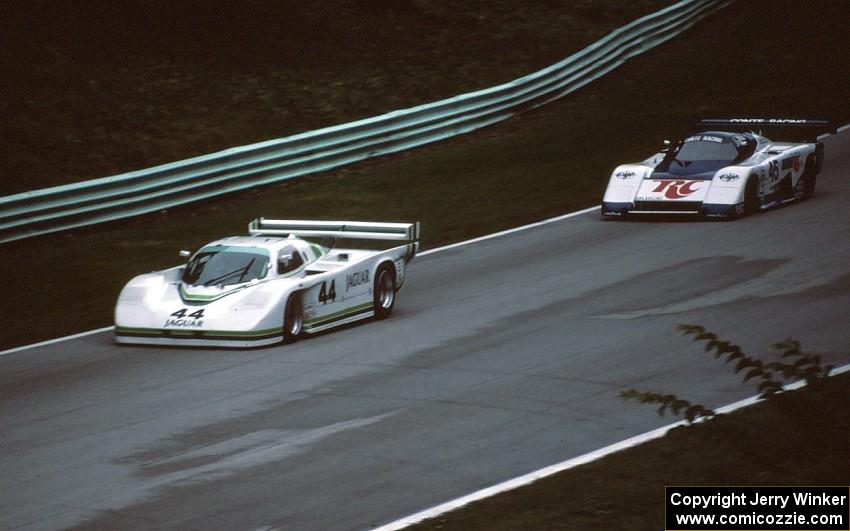 Bob Tullius / Chip Robinson Jaguar XJR-5 leads the Whitney Ganz / Ken Madren Hawk-March 85G/Buick