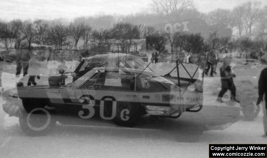 Double exposure of Roger Cardinal's Chevy Corvair (#30) and Chuck McFarlin's Triumph TR-4 (#51)