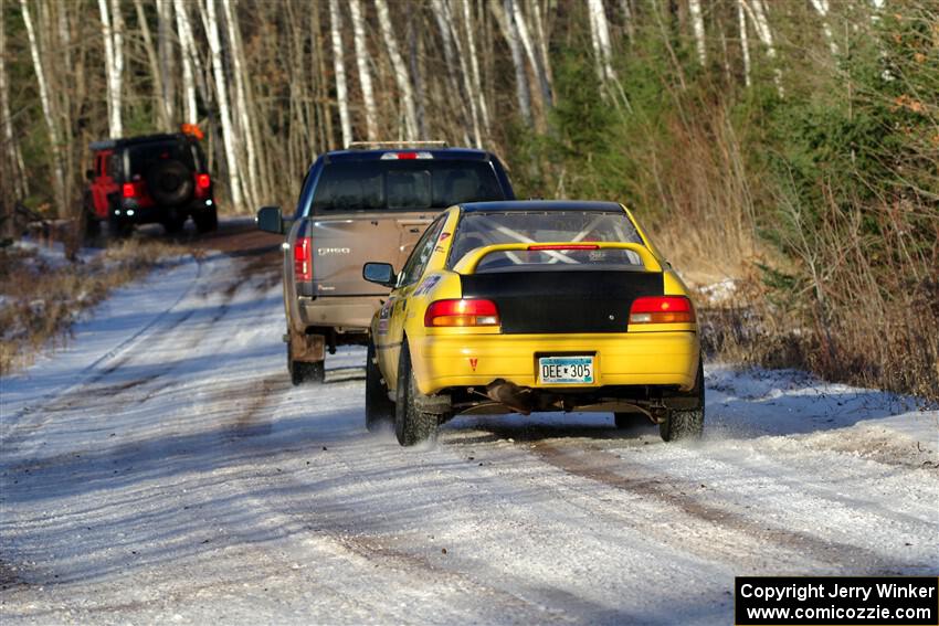 Steve Gingras / Katie Gingras Subaru Impreza is towed out of SS2, Nemadji Trail West, after DNF'ing.