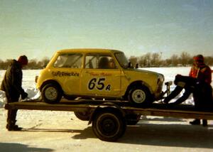 Duane Mahder's Austin Mini-Cooper S goes onto the trailer.