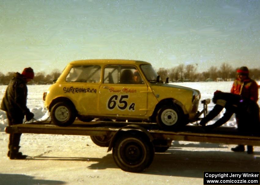 Duane Mahder's Austin Mini-Cooper S goes onto the trailer.