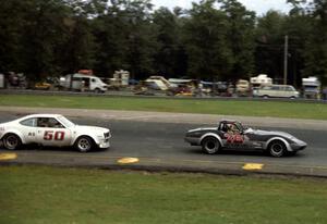 Steve Kline's Chevy Corvette leads Gary Wilczek's AMC AMX out of turn 10.