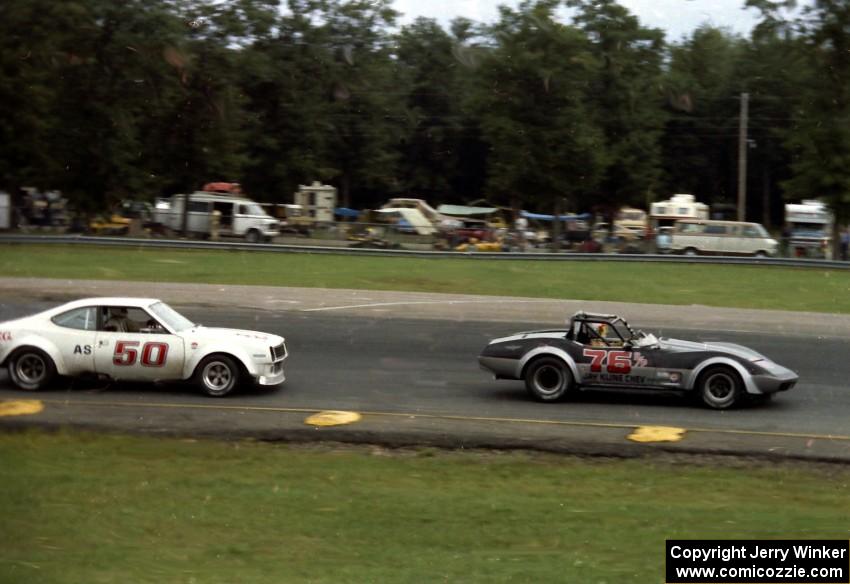 Steve Kline's Chevy Corvette leads Gary Wilczek's AMC AMX out of turn 10.