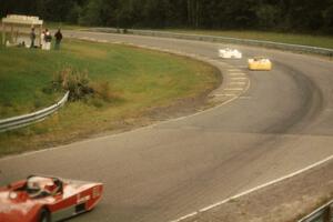 Syd Demovsky's Lola T-590 pulls away from Alan Lewis's Tiga SC80 and John Cahill's Ocelot in the Sports 2000 battle.