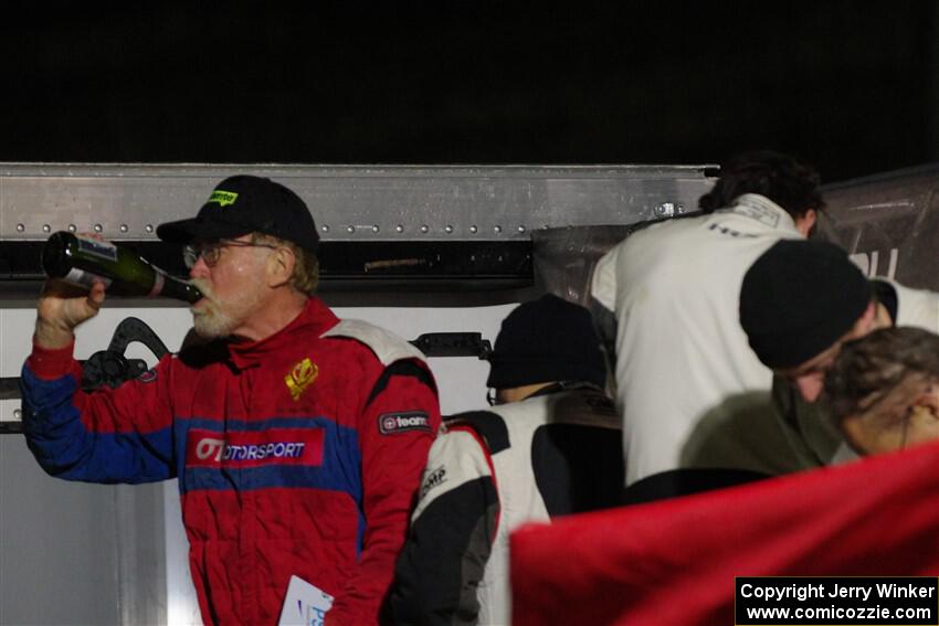 Boyd Smith celebrated finishing 2nd in O2WD with Dan Hayes in their Ford Mustang.