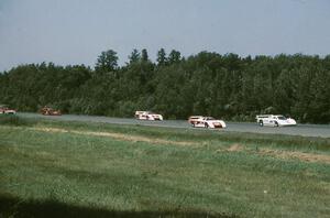 The grid comes into turn one on the pace lap.