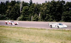 Bob Tullius/ Bill Adam Jaguar XJR-5 leads the Dave Cowart / Kenper Miller March 83G/Chevrolet through turn 1.