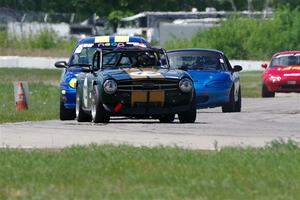 Bob Barton's F Production Triumph TR-6, John Glowaski's ITA Chrysler Neon ACR and Rick Buan's Spec Miata Mazda Miata