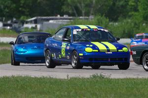 John Glowaski's ITA Chrysler Neon ACR and Rick Buan's Spec Miata Mazda Miata
