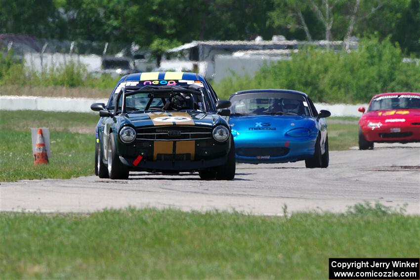 Bob Barton's F Production Triumph TR-6, John Glowaski's ITA Chrysler Neon ACR and Rick Buan's Spec Miata Mazda Miata