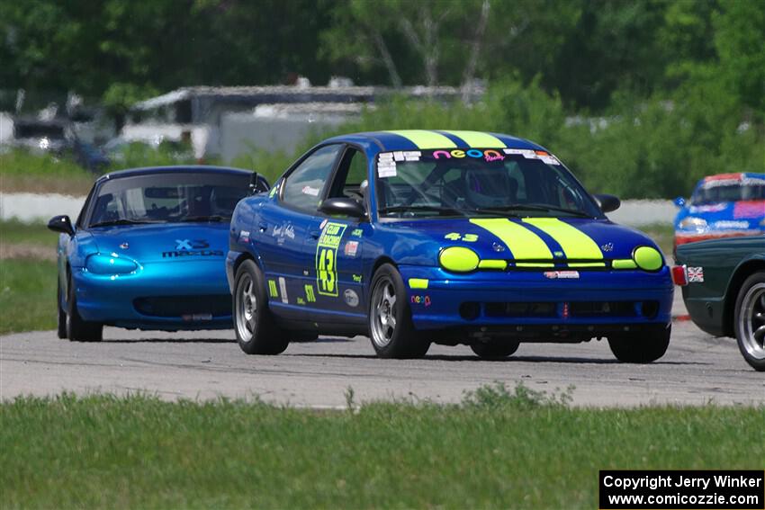John Glowaski's ITA Chrysler Neon ACR and Rick Buan's Spec Miata Mazda Miata