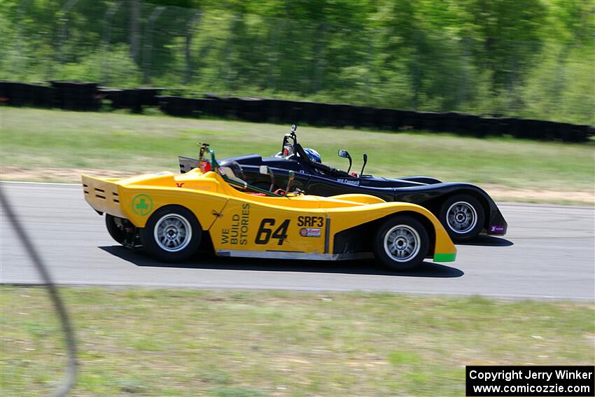 Matt Gray's Spec Racer Ford 3 passes Will Cammack's Spec Racer Ford