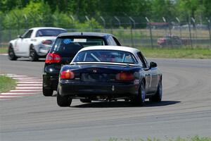 Tom Daly's T4 VW Rabbit and Mike Soward's Spec Miata Mazda Miata