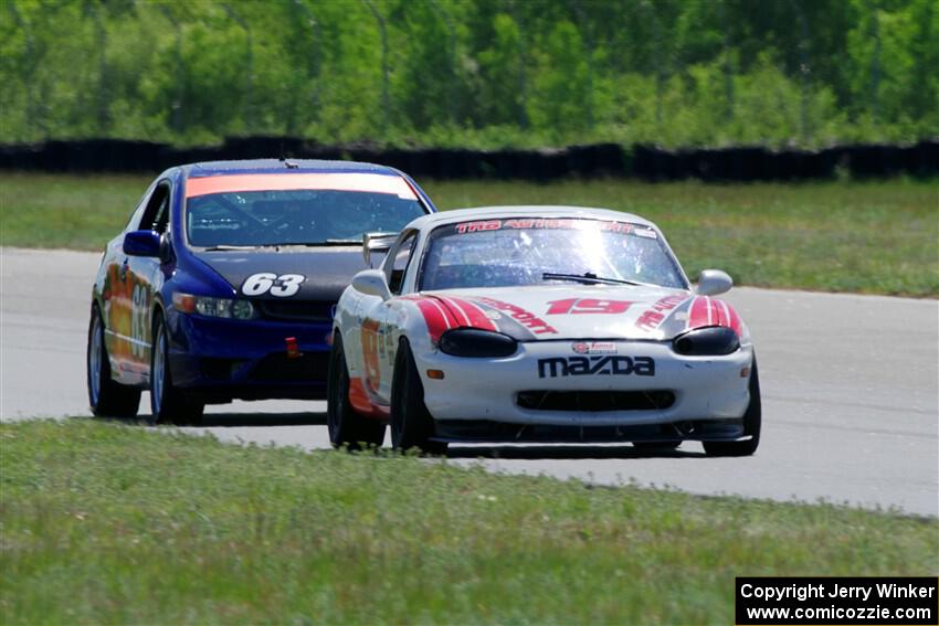 Nolan Elder's STL Mazda Miata and Bill Collins' STL Honda Civic