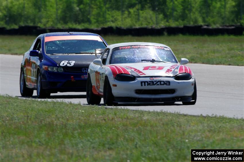 Nolan Elder's STL Mazda Miata and Bill Collins' STL Honda Civic