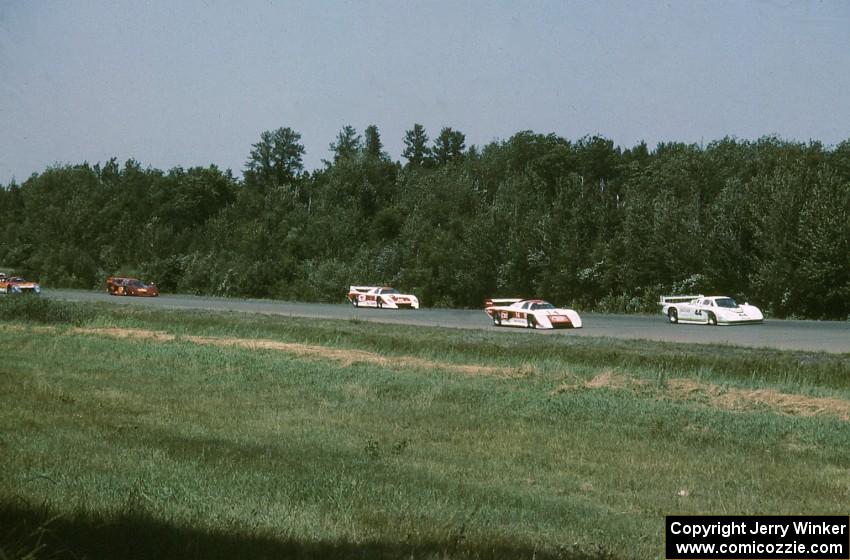 The grid comes into turn one on the pace lap.