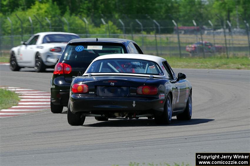 Tom Daly's T4 VW Rabbit and Mike Soward's Spec Miata Mazda Miata
