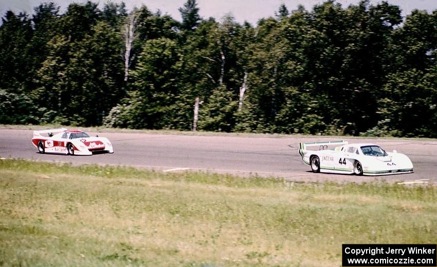 Bob Tullius/ Bill Adam Jaguar XJR-5 leads the Dave Cowart / Kenper Miller March 83G/Chevrolet through turn 1.