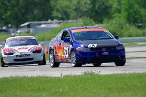 Bill Collins' STL Honda Civic and Nolan Elder's STL Mazda Miata