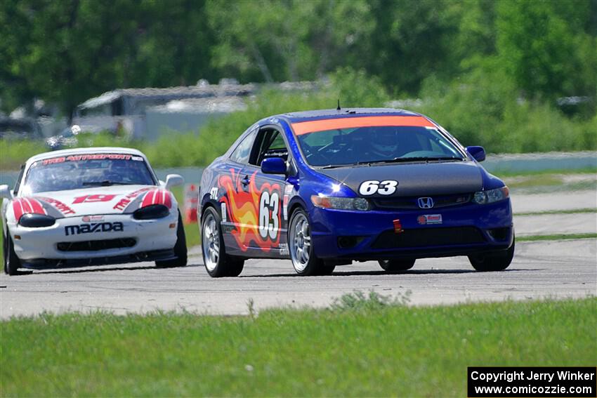 Bill Collins' STL Honda Civic and Nolan Elder's STL Mazda Miata