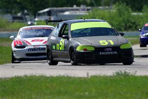 Wade Roggemann's ITJ Honda Civic and Nolan Elder's STL Mazda Miata