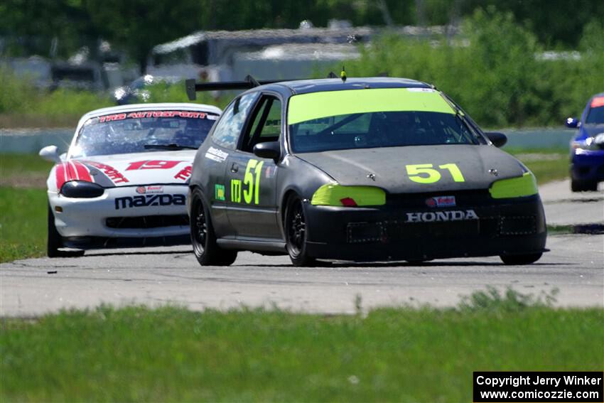 Wade Roggemann's ITJ Honda Civic and Nolan Elder's STL Mazda Miata