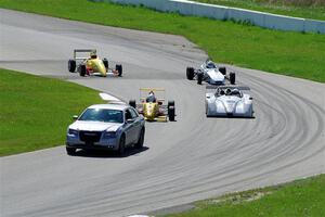 The Formula and Sports Racer group comes through turn 11 on the pace lap.