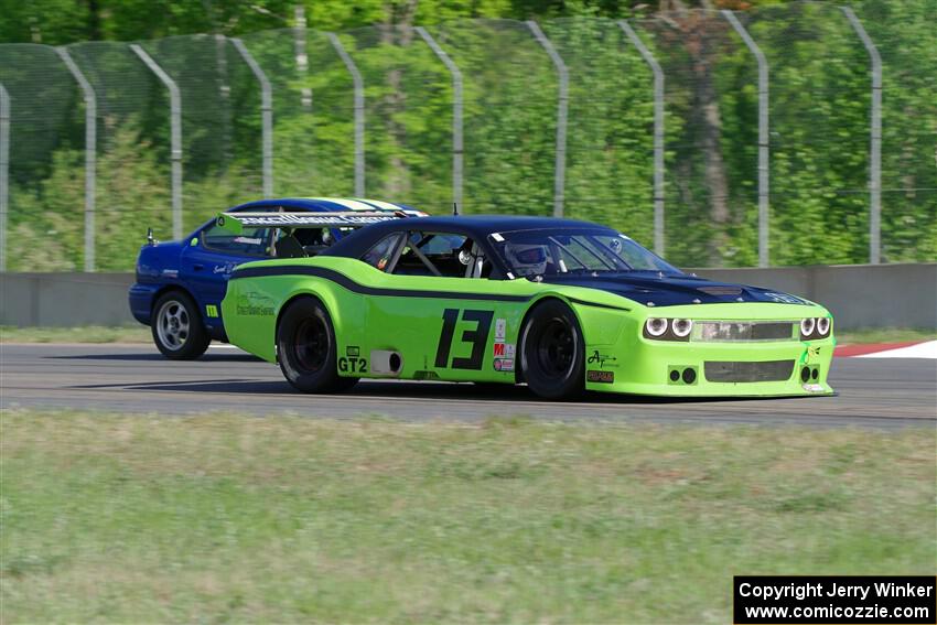 John Glowaski's ITA Chrysler Neon ACR and Robert May's GT-2 Dodge Challenger