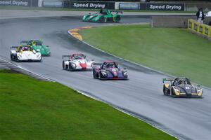 Six Radicals race through the Hurry Downs in the rain.