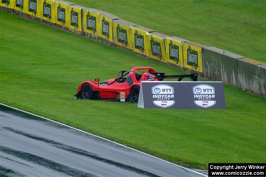 Seth Bacon's Radical SR3 XX 1340 spins off course a turn 6.