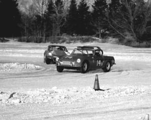 Harvey West's MGB leads Scotty Bell's SAAB Sonnet II