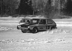 The Hank Godfredson / Dave Strot VW Rabbit ahead of the Don Roderick Austin Mini-Cooper S