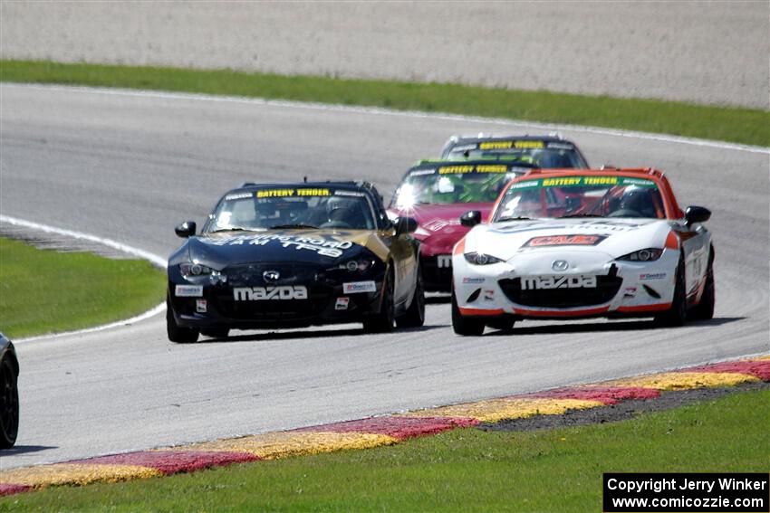 Mark Drennan's, Bryan Ortiz's, Nathanial Sparks' and Matt Cresci's Mazda MX-5 Cups