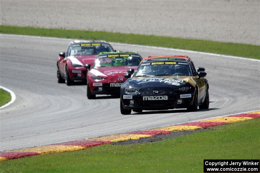Mark Drennan's, Bryan Ortiz's, Nathanial Sparks' and Matt Cresci's Mazda MX-5 Cups