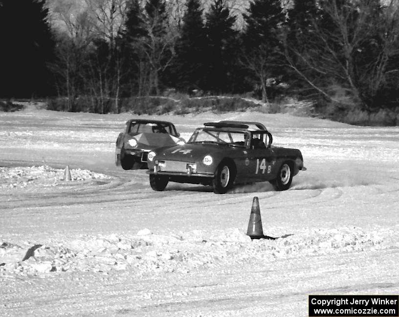 Harvey West's MGB leads Scotty Bell's SAAB Sonnet II