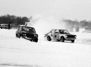 The marooned Mike Kime / Bill Bartolic Datsun 510 is lapped by the similar car of Tim Winker / Mike Winker