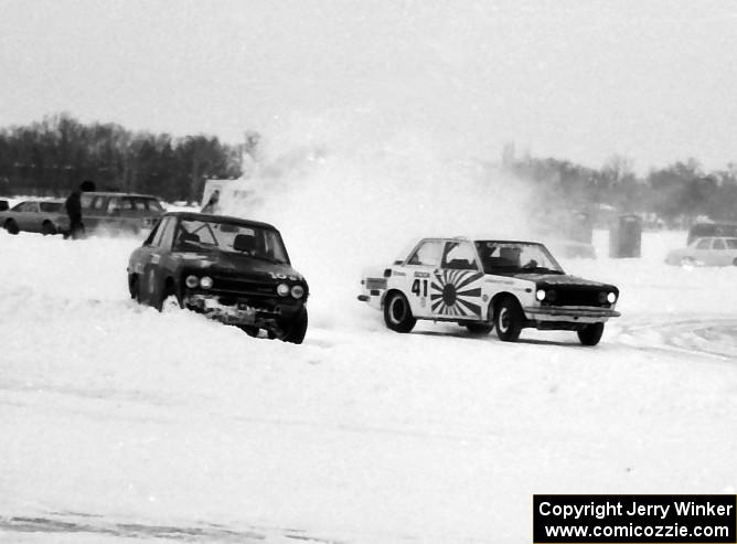 The marooned Mike Kime / Bill Bartolic Datsun 510 is lapped by the similar car of Tim Winker / Mike Winker