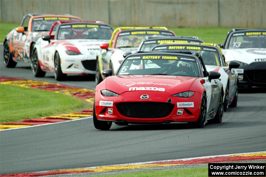 Gresham Wagner's Mazda MX-5 Cup leads a pack of seven cars.