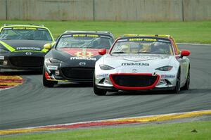 Drake Kemper's, Peter Ensor's and Luke Oxner's Mazda MX-5 Cups