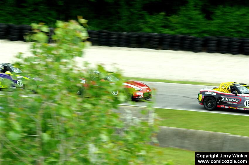 Danny Bender's, Michael Carter's and Selin Rollan's Mazda MX-5 Cups