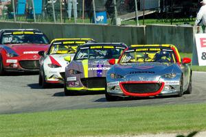 Drake Kemper's, Selin Rollan's, Danny Bender's and Michael Carter's Mazda MX-5 Cups
