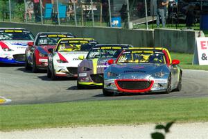 Drake Kemper's, Selin Rollan's, Danny Bender's, Michael Carter's and Robert Stout's Mazda MX-5 Cups