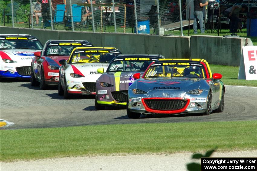 Drake Kemper's, Selin Rollan's, Danny Bender's, Michael Carter's and Robert Stout's Mazda MX-5 Cups