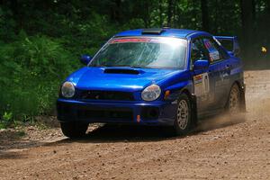Jimmy Pelizzari / Bryce Proseus Subaru WRX on SS1, Camp 3 North.