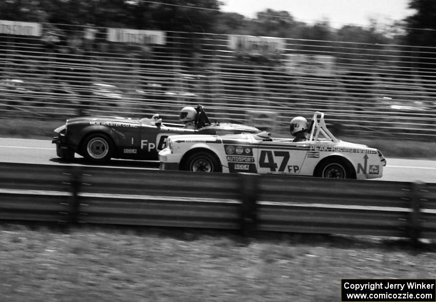 (47) Bob Hubbard's MG Midget races (80) Martin 'John' Stoesser's Triumph Spitfire for the FP win.