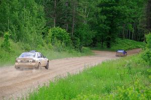 Tim Michel / Alex Ferencz Audi A4 Quattro chases Jimmy Pelizzari / Bryce Proseus Subaru WRX on SS3, Woodtick Hollow.