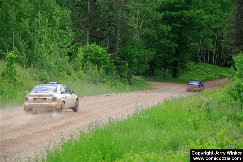 Tim Michel / Alex Ferencz Audi A4 Quattro chases Jimmy Pelizzari / Bryce Proseus Subaru WRX on SS3, Woodtick Hollow.